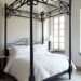 dramatic black framed canopy beds
