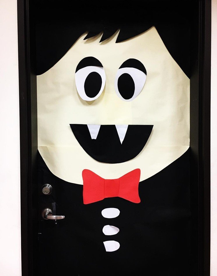 Friendly Vampire Face Door With a Red Bow Tie