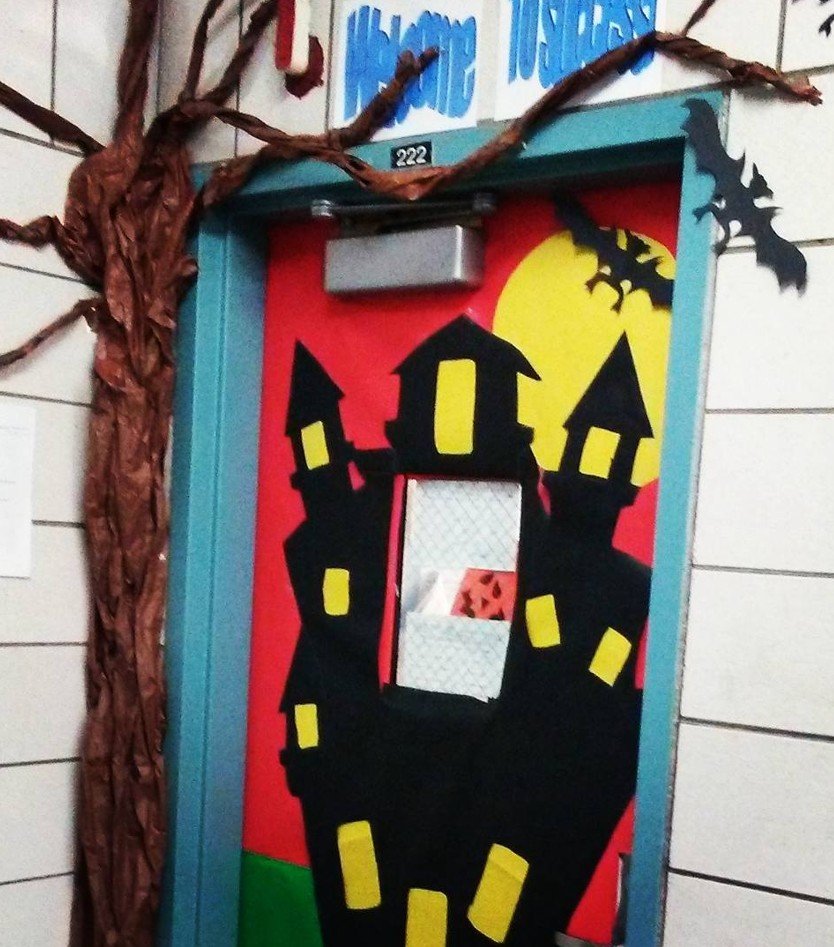 Haunted House Silhouette Door With a Twisted Paper Tree
